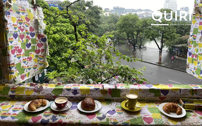 A colorful Hanoi coffee shop filled with stories and notes.