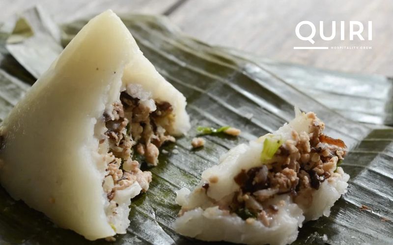 A soft and savory traditional snack wrapped in fragrant banana leaves.
