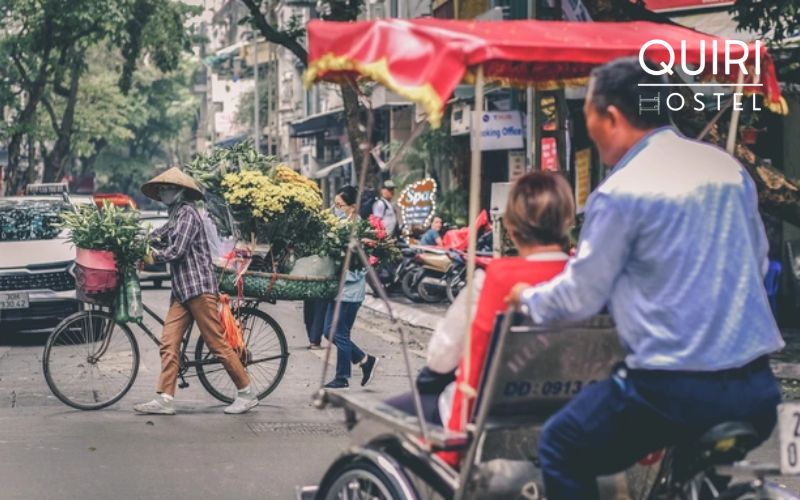 A Hanoi cyclo tour passes through flavorful streets and vibrant markets.