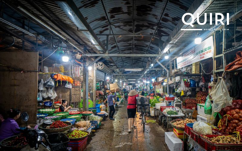 Markets in Hanoi stay vibrant, even with rain drumming on rooftops.