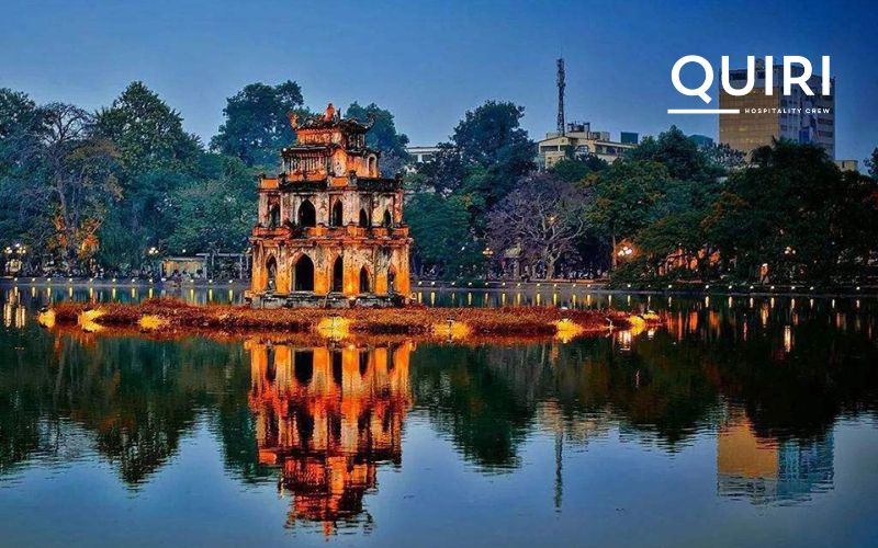 Relax by Hoan Kiem Lake at night enjoying calm evening walks.