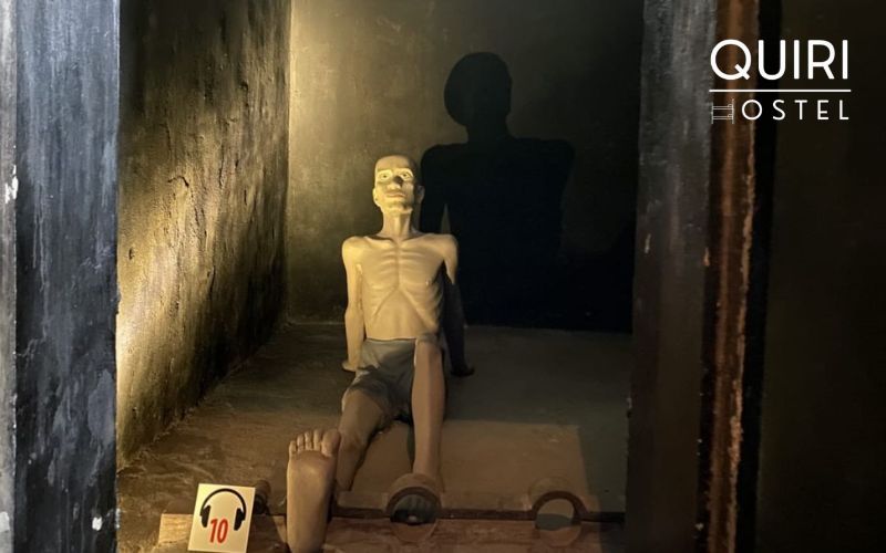 Step inside the Cachot, a chilling echo of suffering.