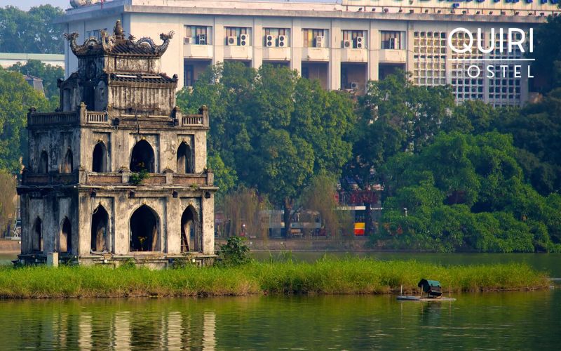 The lake’s calm scenery pairs well with bustling Opera de Hanoi vibes.