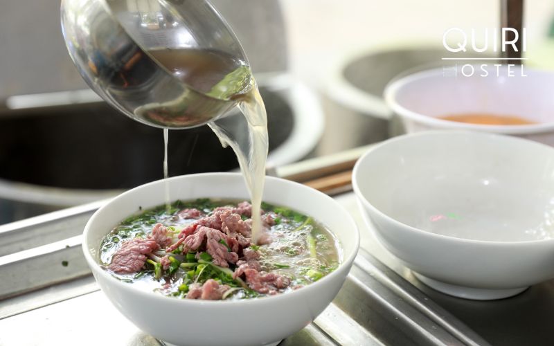 Best pho in Hanoi introduces visitors to local life.
