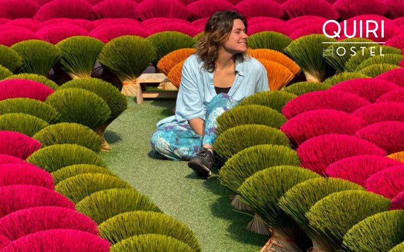 Bright drying yards create striking scenes often admired during an incense village Hanoi visit.