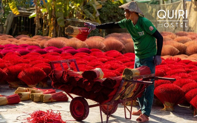 Daily life unfolds gently throughout the lanes of Quang Phu Cau Incense Village.
