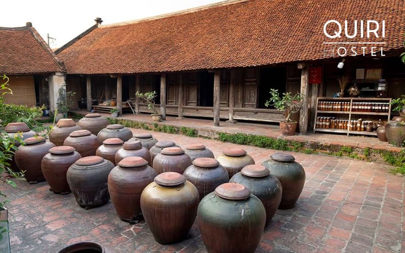Laterite houses reveal the spirit of a traditional Vietnamese village.