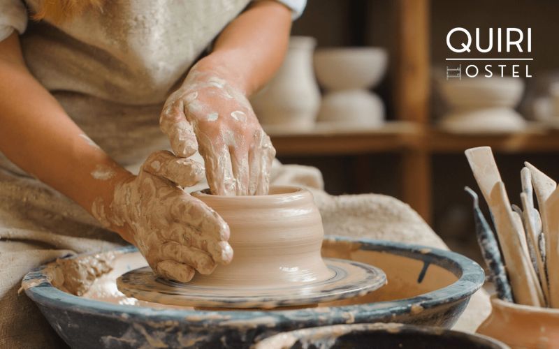 Visitors enjoy shaping clay while learning centuries-old techniques from artisans.