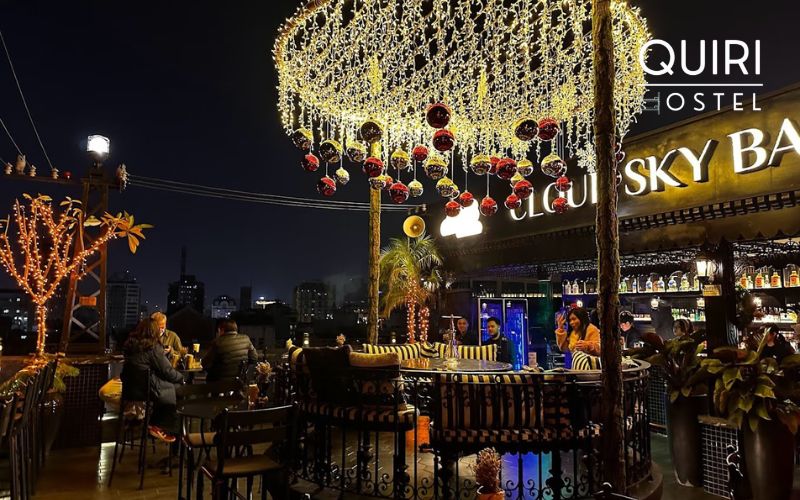 A mid-route rooftop break between louder bars in Hanoi.