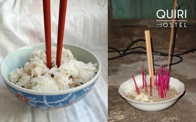 Never stick chopsticks upright in a bowl of rice